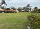 Aerial view of a community with lush green lawns and houses at 1318 56Th W St # 1318, Bradenton, FL 34209