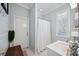 Stylish bathroom featuring shiplap accent wall, neutral colors, and bright natural lighting at 14116 Nighthawk Ter, Lakewood Ranch, FL 34202