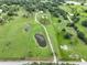 Aerial view of a large property with two ponds at 15409 Waterline Rd, Bradenton, FL 34212