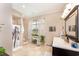 Main bathroom boasts double vanity and large shower at 15409 Waterline Rd, Bradenton, FL 34212