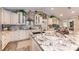 Large kitchen island with granite countertop and white cabinets at 15409 Waterline Rd, Bradenton, FL 34212