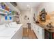 Bright laundry room with shelving and counter space at 15409 Waterline Rd, Bradenton, FL 34212