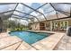 Lush landscape surrounds this screened pool at 15409 Waterline Rd, Bradenton, FL 34212