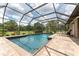 Screened pool and spa with paver deck at 15409 Waterline Rd, Bradenton, FL 34212