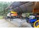 Covered storage area for boat, kayaks, and ATV at 15409 Waterline Rd, Bradenton, FL 34212