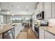 Spacious kitchen with stainless steel appliances and granite countertops at 16008 Crofton Springs Way, Port Charlotte, FL 33953