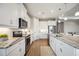 Modern kitchen with stainless steel appliances and granite countertops at 16008 Crofton Springs Way, Port Charlotte, FL 33953