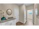 Laundry area with white cabinets and granite countertop at 1637 Turrell St, North Port, FL 34286