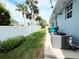 Landscaped backyard with a privacy fence at 18652 Ohara Dr, Port Charlotte, FL 33948