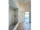 Spa-like bathroom with walk-in shower and private pool access at 18652 Ohara Dr, Port Charlotte, FL 33948