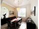 Elegant dining room featuring a large table and chandelier at 18652 Ohara Dr, Port Charlotte, FL 33948