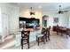 Modern kitchen with dark cabinets and granite countertops at 18652 Ohara Dr, Port Charlotte, FL 33948