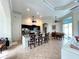 Modern kitchen with dark cabinets and granite countertops at 18652 Ohara Dr, Port Charlotte, FL 33948