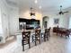 Modern kitchen with dark cabinets and granite countertops at 18652 Ohara Dr, Port Charlotte, FL 33948