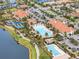 Aerial view of community pool and clubhouse at 19066 Mangieri St, Venice, FL 34293