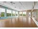 Spacious fitness room with hardwood floors and large windows at 19066 Mangieri St, Venice, FL 34293