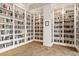 Well-lit library with floor-to-ceiling bookshelves at 19066 Mangieri St, Venice, FL 34293