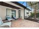 Enjoy this screened porch with comfortable lounge chairs and a view of the backyard at 19066 Mangieri St, Venice, FL 34293