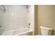 Bathroom with a shower and white tile at 209 Brindisi Cir, Nokomis, FL 34275