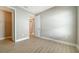 Bright bedroom with wood-look floors and spacious closet at 209 Brindisi Cir, Nokomis, FL 34275