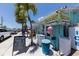 Beach-themed convenience store with ice cream and beach supplies at 210 Willow Ave, Anna Maria, FL 34216