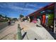 Brick paved beachfront path alongside shops and beach access at 210 Willow Ave, Anna Maria, FL 34216