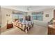 Bedroom with a queen-size bed and wood furniture at 210 Willow Ave, Anna Maria, FL 34216