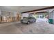 Attached garage with ample space for one car at 210 Willow Ave, Anna Maria, FL 34216