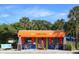 Casual beachfront restaurant with outdoor seating and bright decor at 210 Willow Ave, Anna Maria, FL 34216