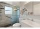 Updated bathroom with a walk-in shower, toilet and vanity at 2145 Pueblo Cir # V12, Sarasota, FL 34231