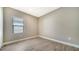 Bright bedroom with wood-look floors and large window at 221 Brindisi Cir, Nokomis, FL 34275