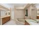 Elegant bathroom with a large soaking tub and double vanity at 3339 Highlands Bridge Rd # 65, Sarasota, FL 34235