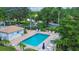 Community pool with plenty of lounge chairs for relaxation at 3339 Highlands Bridge Rd # 65, Sarasota, FL 34235