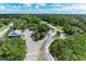 Aerial view of park with parking and building at 360 Pine Run Dr, Osprey, FL 34229