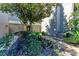 Well-manicured landscaping surrounds the entrance to this condo at 360 Pine Run Dr, Osprey, FL 34229