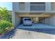 Covered carport parking for condo residents at 360 Pine Run Dr, Osprey, FL 34229