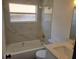 Clean bathroom with bathtub and gold finishes at 3611 3Rd S Ave, St Petersburg, FL 33711