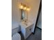 Updated bathroom, featuring a white vanity and gold fixtures at 3611 3Rd S Ave, St Petersburg, FL 33711