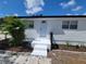 Newly renovated home with a fresh coat of paint and landscaping at 3611 3Rd S Ave, St Petersburg, FL 33711