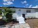 Newly renovated home with a fresh coat of paint and landscaping at 3611 3Rd S Ave, St Petersburg, FL 33711