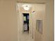 Hallway with bathroom and closet access at 3756 Lake Bayshore # 509, Bradenton, FL 34205