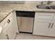 Stainless steel dishwasher is built into the cabinetry at 3756 Lake Bayshore # 509, Bradenton, FL 34205