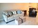 Living Room with Beige couch and brown chair at 3756 Lake Bayshore # 509, Bradenton, FL 34205