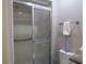 Small bathroom with walk in shower and grab bars at 376 Oak Hill Dr # 36, Sarasota, FL 34232