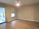 Bedroom with wood-look flooring and neutral walls at 376 Oak Hill Dr # 36, Sarasota, FL 34232