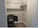 Closet with wire shelving and in-closet safe at 376 Oak Hill Dr # 36, Sarasota, FL 34232