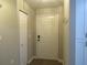 Bright entryway with coat rack and neutral colors at 376 Oak Hill Dr # 36, Sarasota, FL 34232