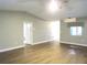 Bright living room showcasing wood-look flooring and neutral walls at 376 Oak Hill Dr # 36, Sarasota, FL 34232