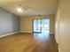 Spacious living room with light walls and wood-look floors at 376 Oak Hill Dr # 36, Sarasota, FL 34232