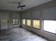 Sunroom with tile floor and multiple windows at 376 Oak Hill Dr # 36, Sarasota, FL 34232